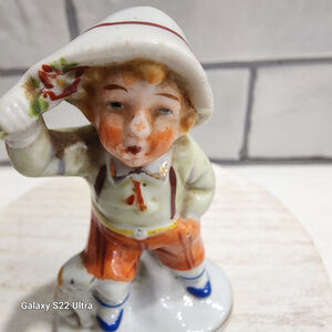 Porcelain Occupied Japan Boy-puppy Figurine Vintage